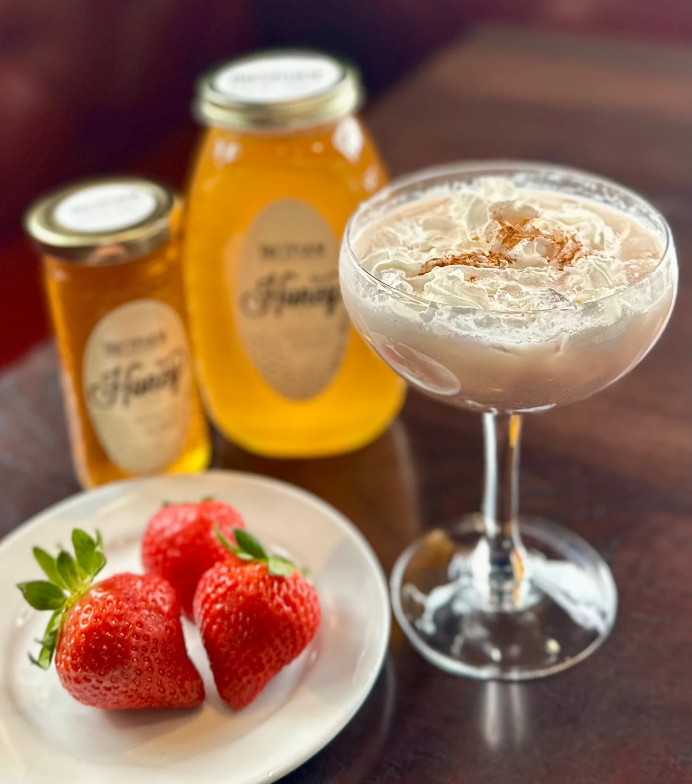 Hospitality beverage photography of seasonal beverage trio with strawberries