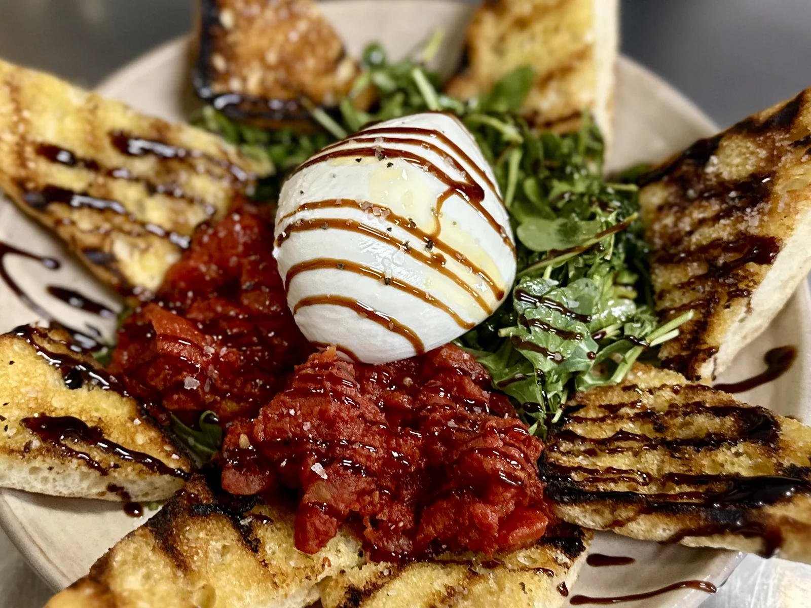 Restaurant food photography of meatballs with mozzarella and grilled bread